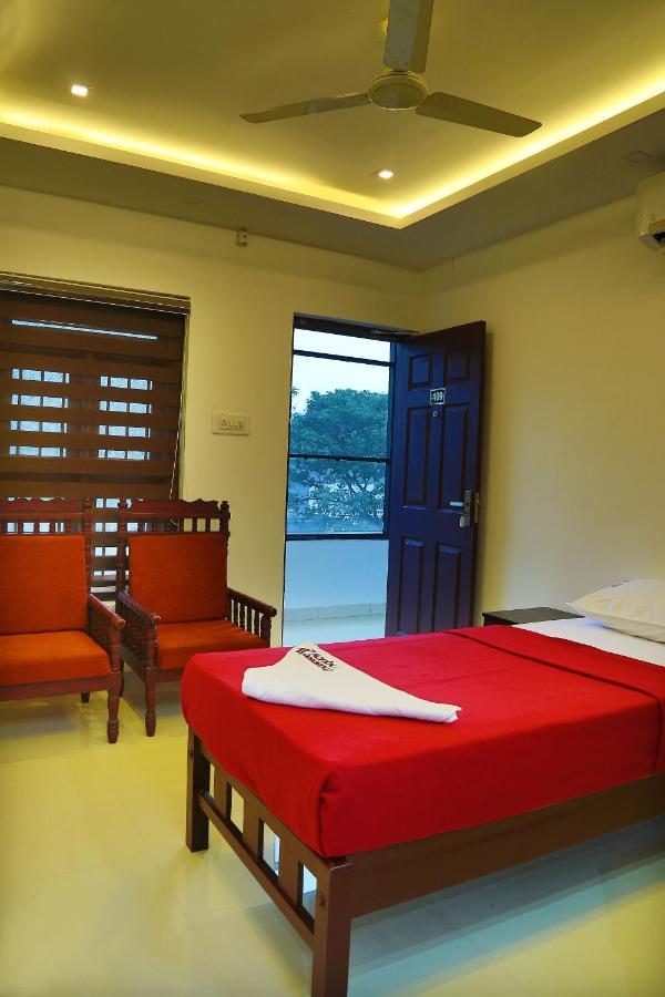 Karibu Residency Hotel Malappuram Buitenkant foto